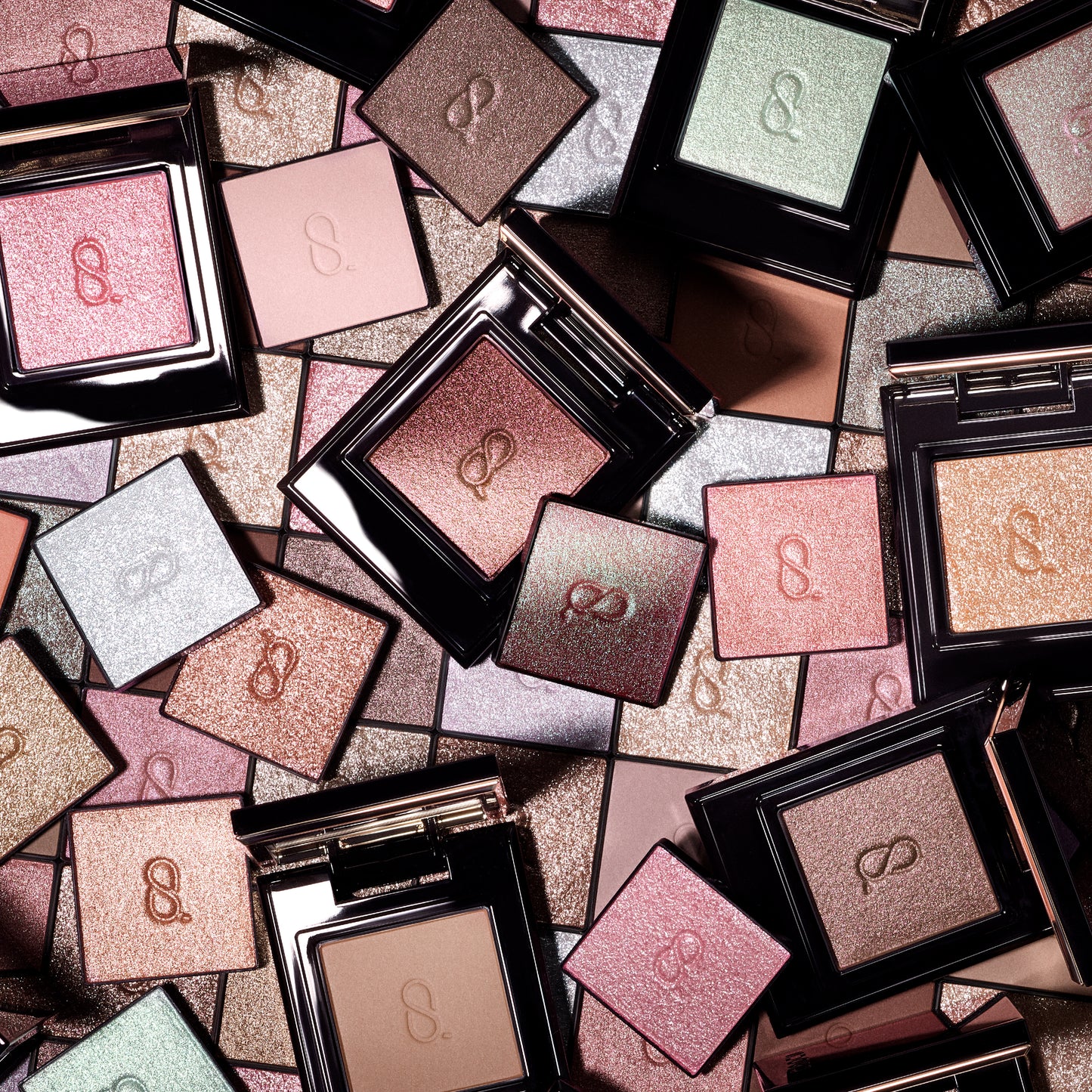 SUQQU Mono Look Eyes range of luxurious, best quality creamy powder eyeshadows from Japan. Collage of many different colours and textures.