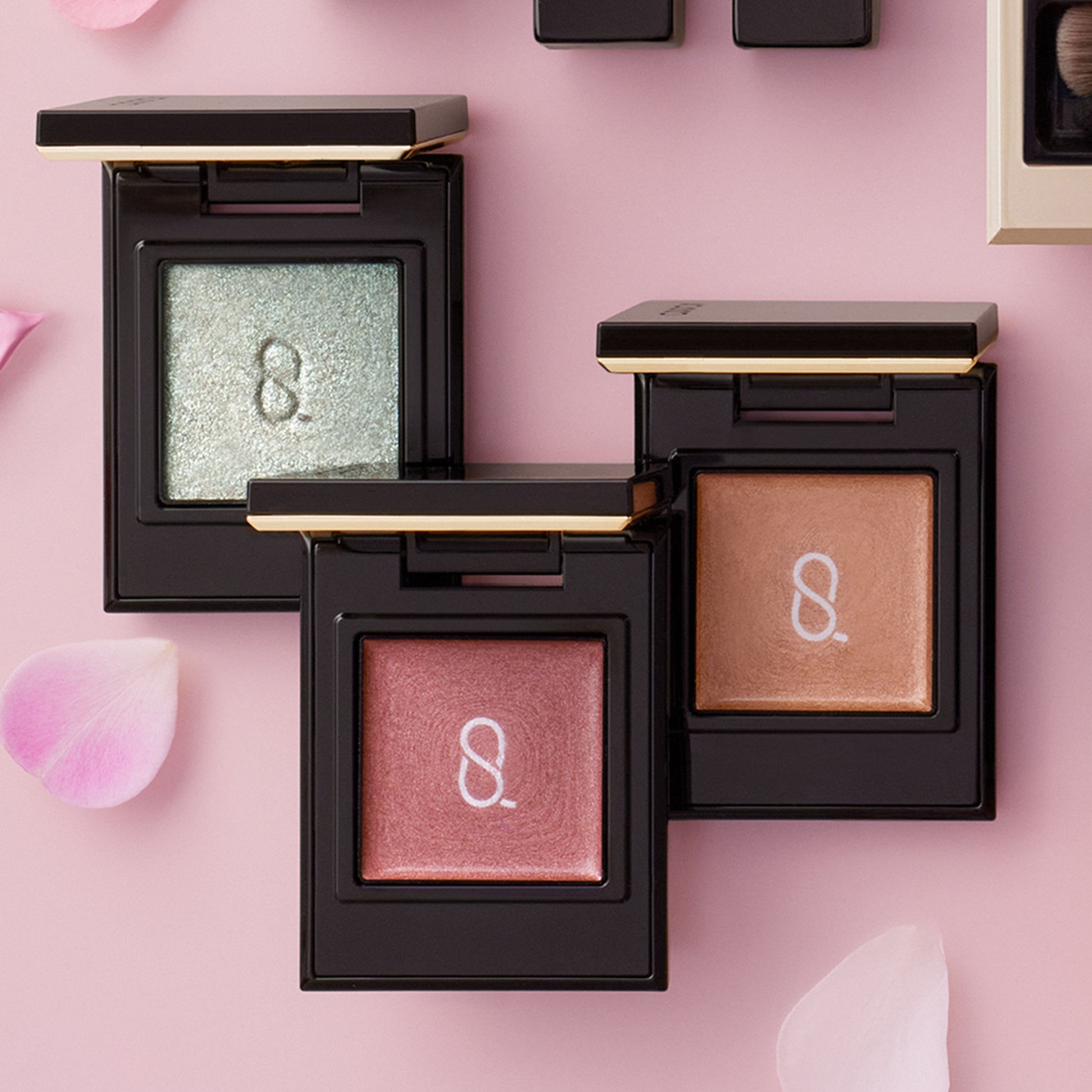 Three SUQQU Mono Look Eyes single colour eyeshadows with lids open