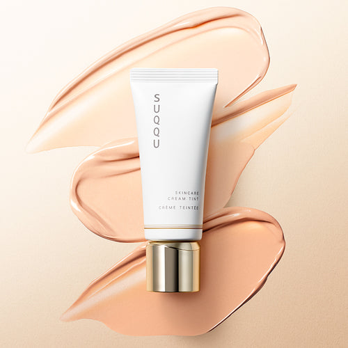 SUQQU Skincare Cream Tint foundation tube with colour texture swatches.