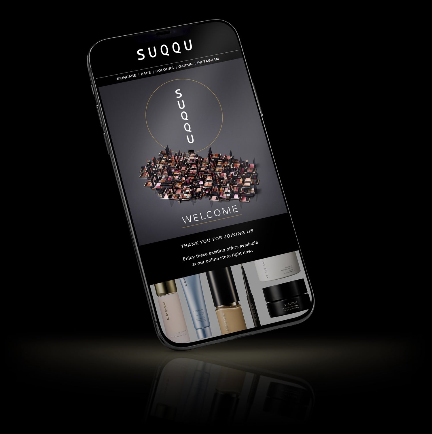 Mobile phone with screen displaying an email newsletter.