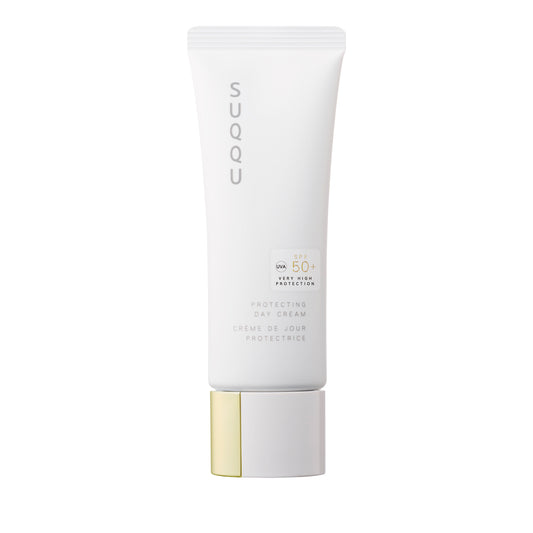 SUQQU Protecting Day Cream 50g Japanese luxury reliable sunscreen SPF 50+ moisturising face care base make up product on plain background.