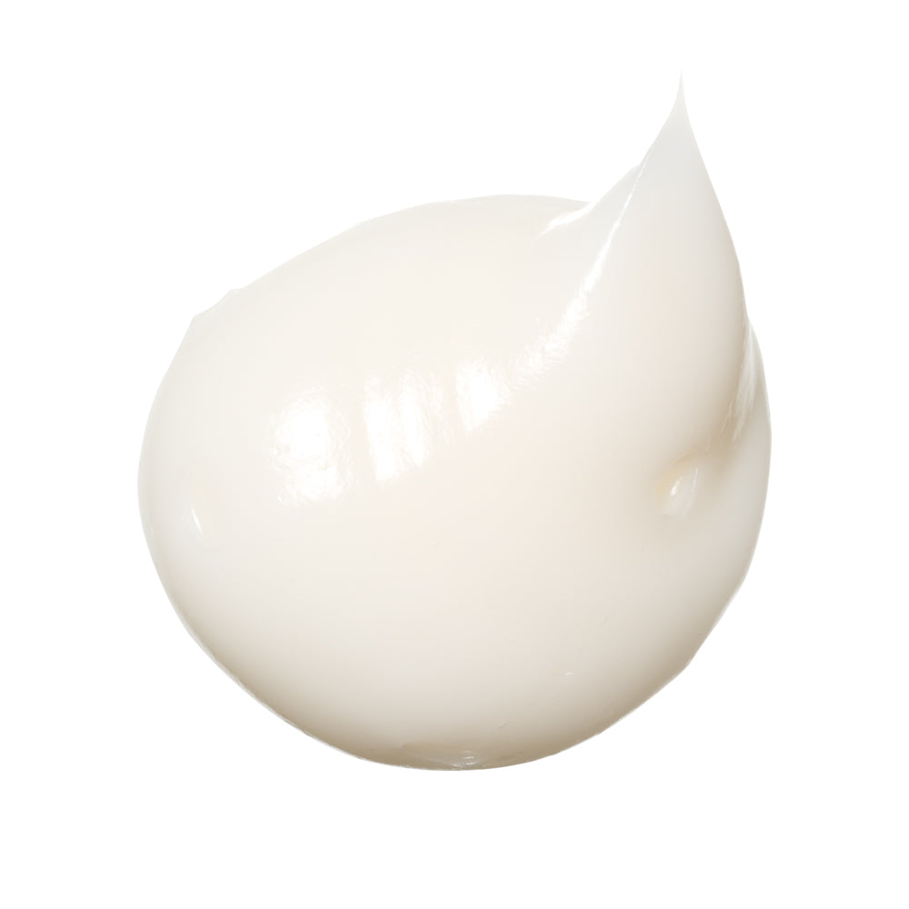 SUQQU Designing Massage Cream - Bath skincare cream texture swatch on plain white background.