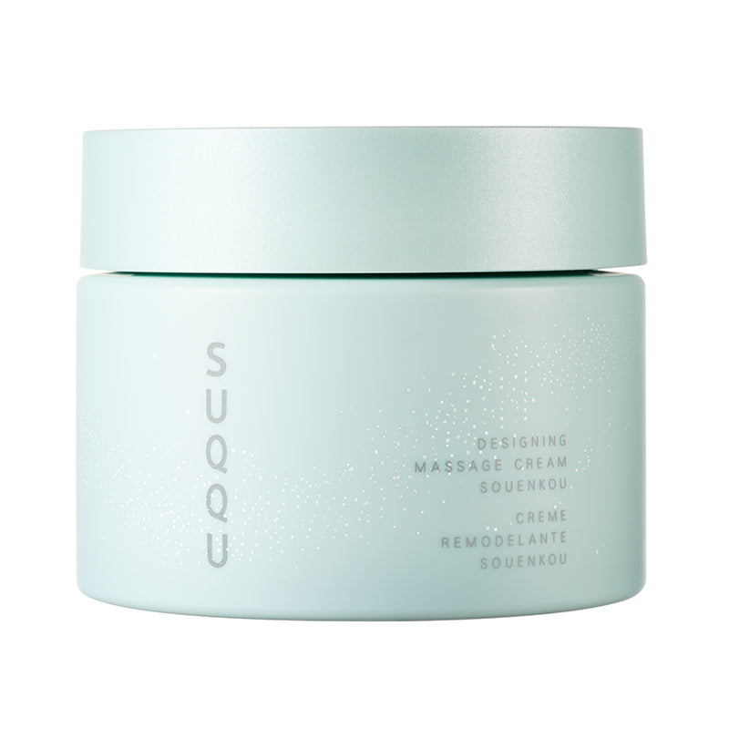 SUQQU Designing Massage Cream Kit Souenkou. Massage cream pot on plain background.