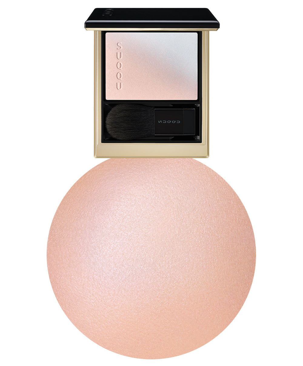 SUQQU Spring Collection 2026 Blurring Color Highlighter 101 makeup palette open. Displayed next to close up of product applied to models cheek.