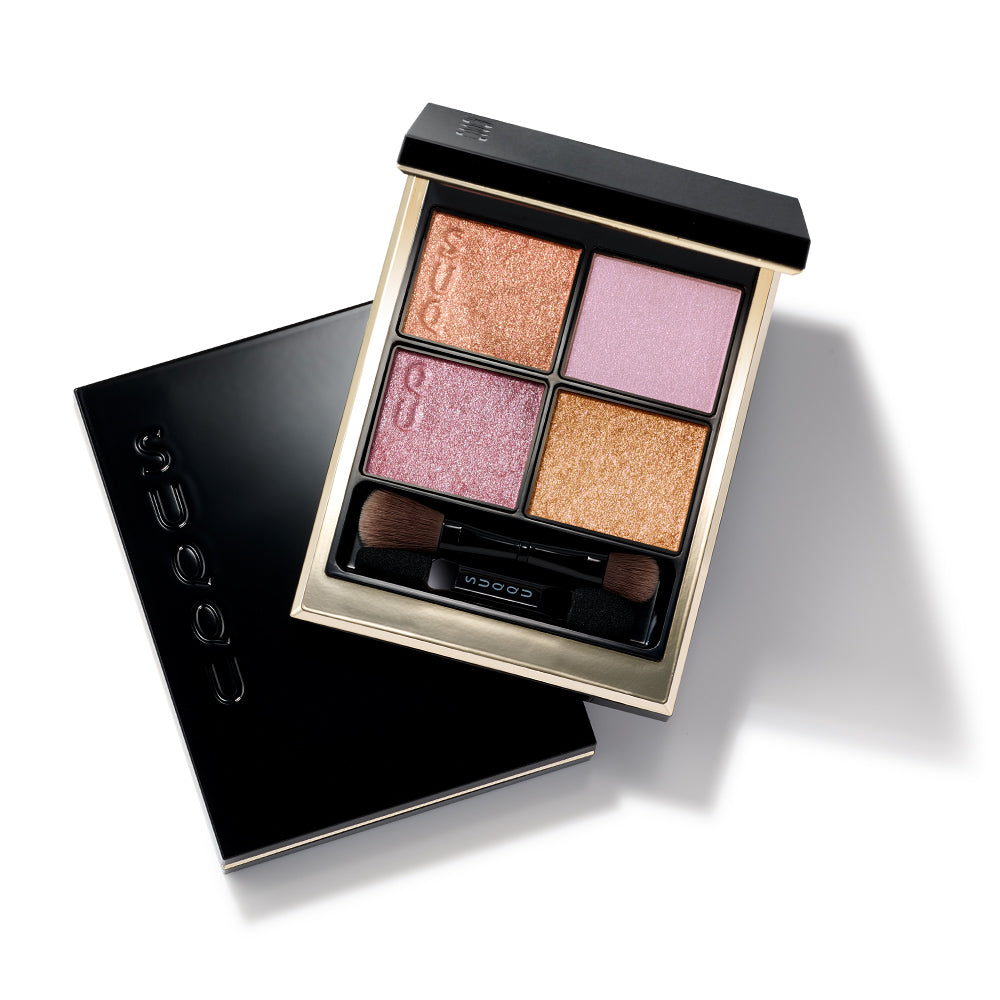 SUQQU Spring Collection 2026 Signature Color Eyes 151 luxury makeup eyeshadow palette open on a table above a closed palette.