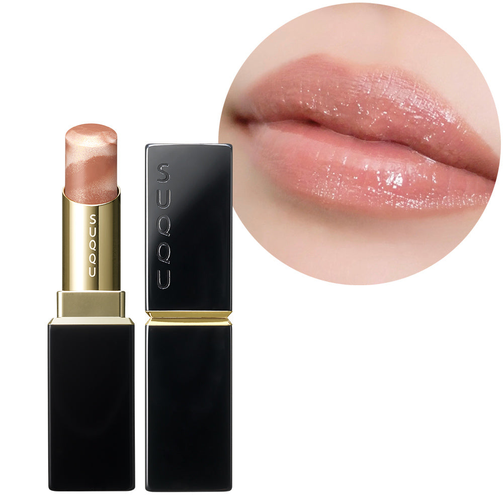 SUQQU 2026 Summer Collection Moisture Glaze Lipstick 112 in brown red colour. Shown with model wear lip close up swatch. Discover some of the very the best lipsticks from Japan at SUQQU.