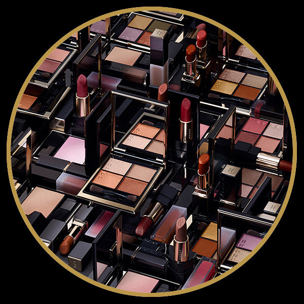 Colourful make up products grouped together