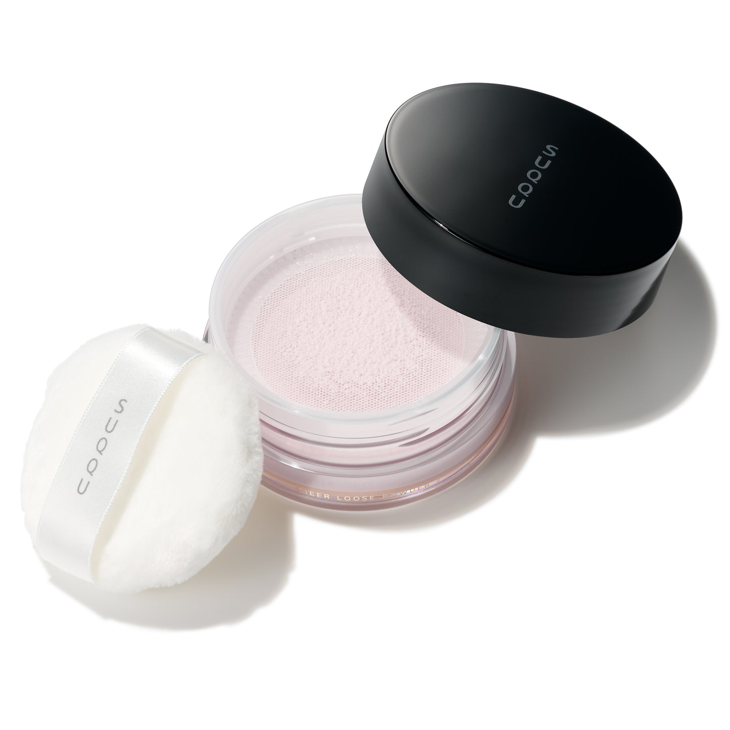 SUQQU Sheer Loose Powder e face powder pot with puff on white background.
