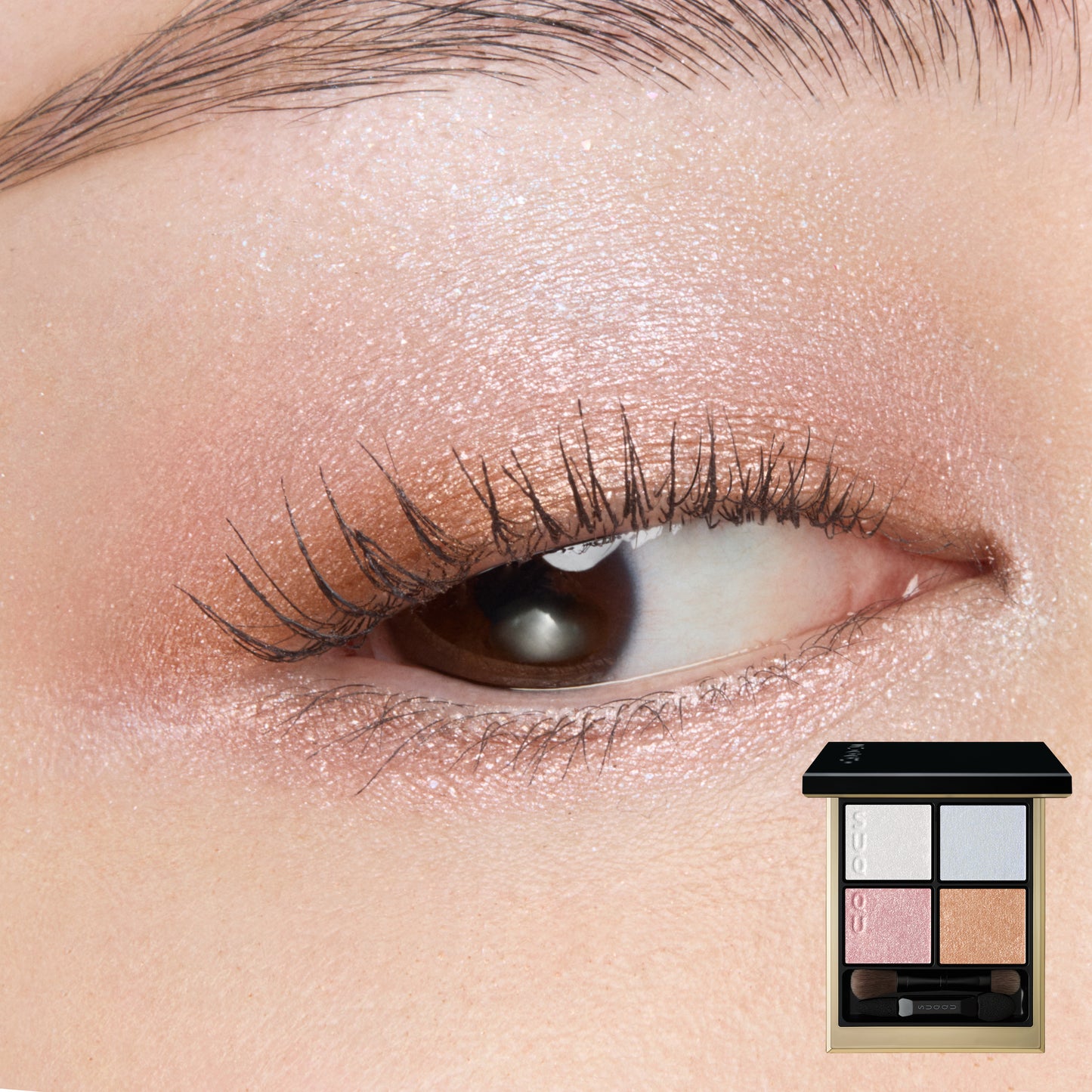 SUQQU Signature Color Eyes 156 shimmering pearl pink and blue eyeshadow shown worn on model eye close up.