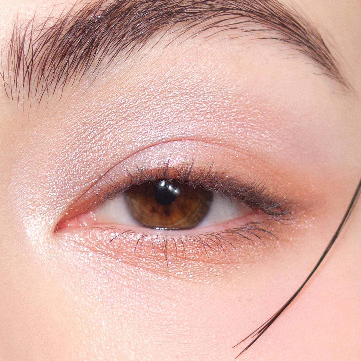 SUQQU Signature Color Eyes 156 glittering pearl eyeshadow shown worn on model eye close up.