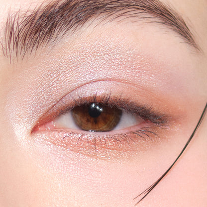 SUQQU Signature Color Eyes 156 glittering pearl eyeshadow shown worn on model eye close up.