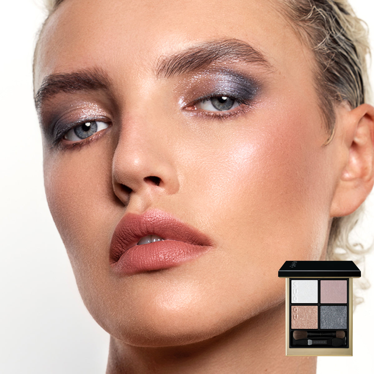 Close-up of a woman's face with shimmery Signature Color Eyes 158 eyeshadow and pink beige lipstick, with a small four-shade eyeshadow palette shown in the lower right corner against a light gray background.