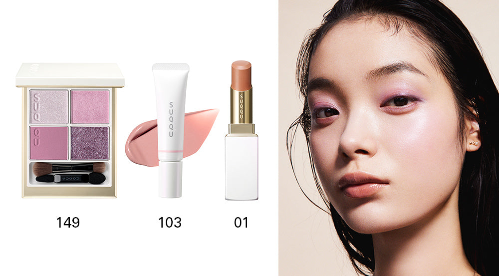 SUQQU 2025 Holiday Collection makeup kit Shunka showing pink toned quad eyeshadow palette 149 and soft pink liquid blush tube 103 with Moisture Glaze Lipstick 01 and model portrait wearing the makeup.