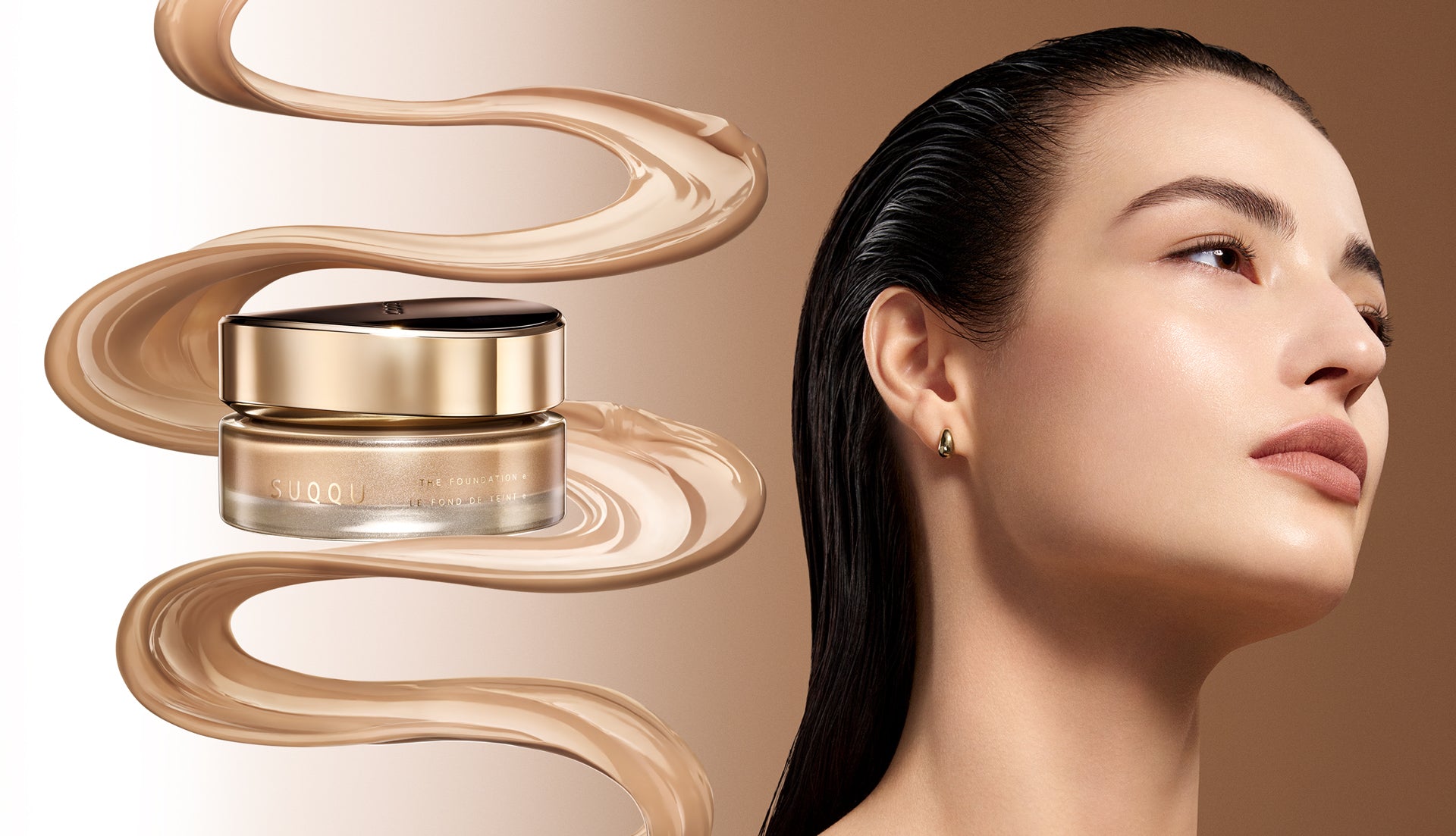 A SUQQU 'The Foundation e' jar with a gold cap and beige foundation cream swirls on a warm beige background, alongside a close-up of a woman's radiant and flawless face complexion.
