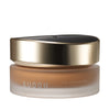 SUQQU The Foundation 165 luxury moisturising Japanese cream base make up pot on plain background.