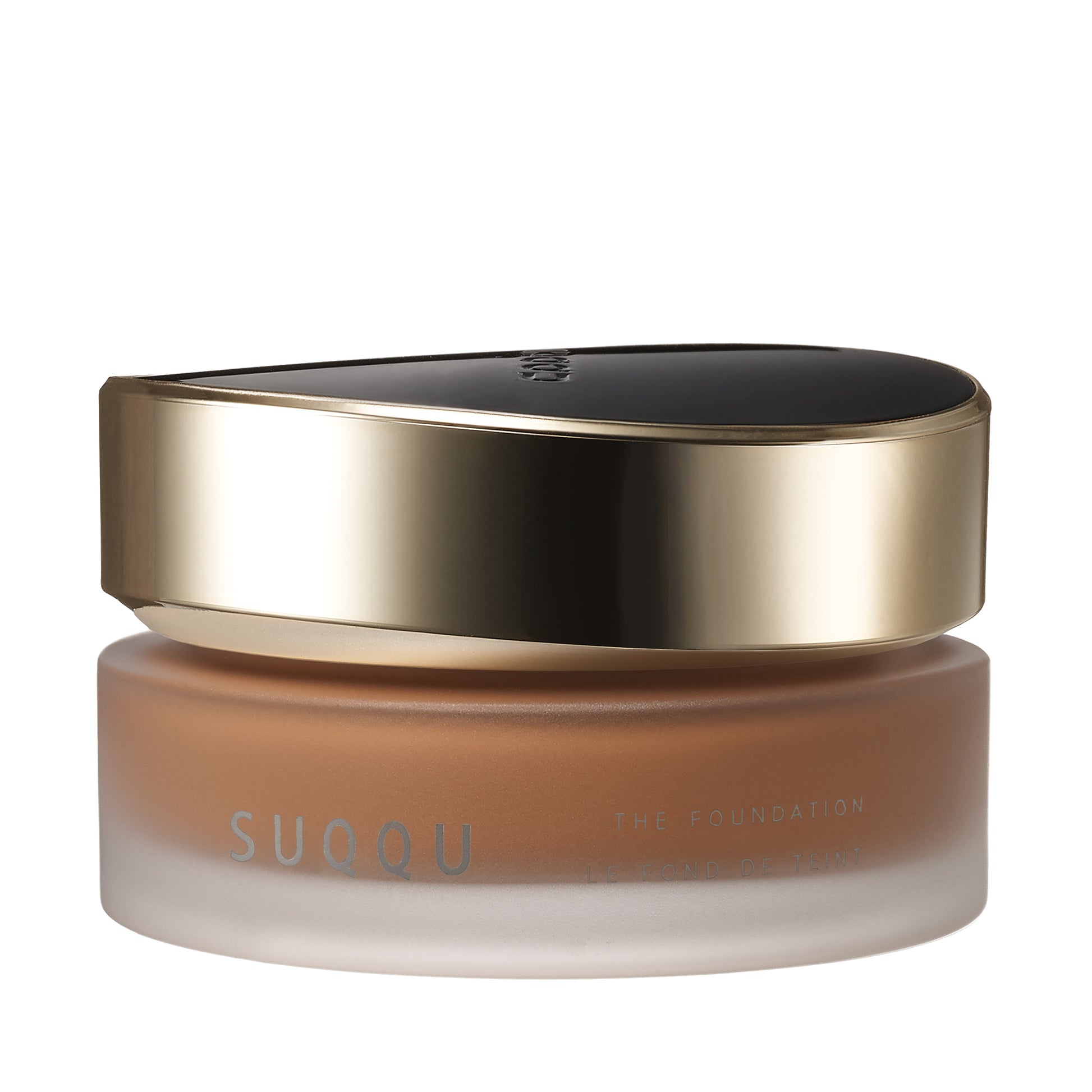 SUQQU The Foundation 265 luxury moisturising Japanese cream base make up pot on plain background.