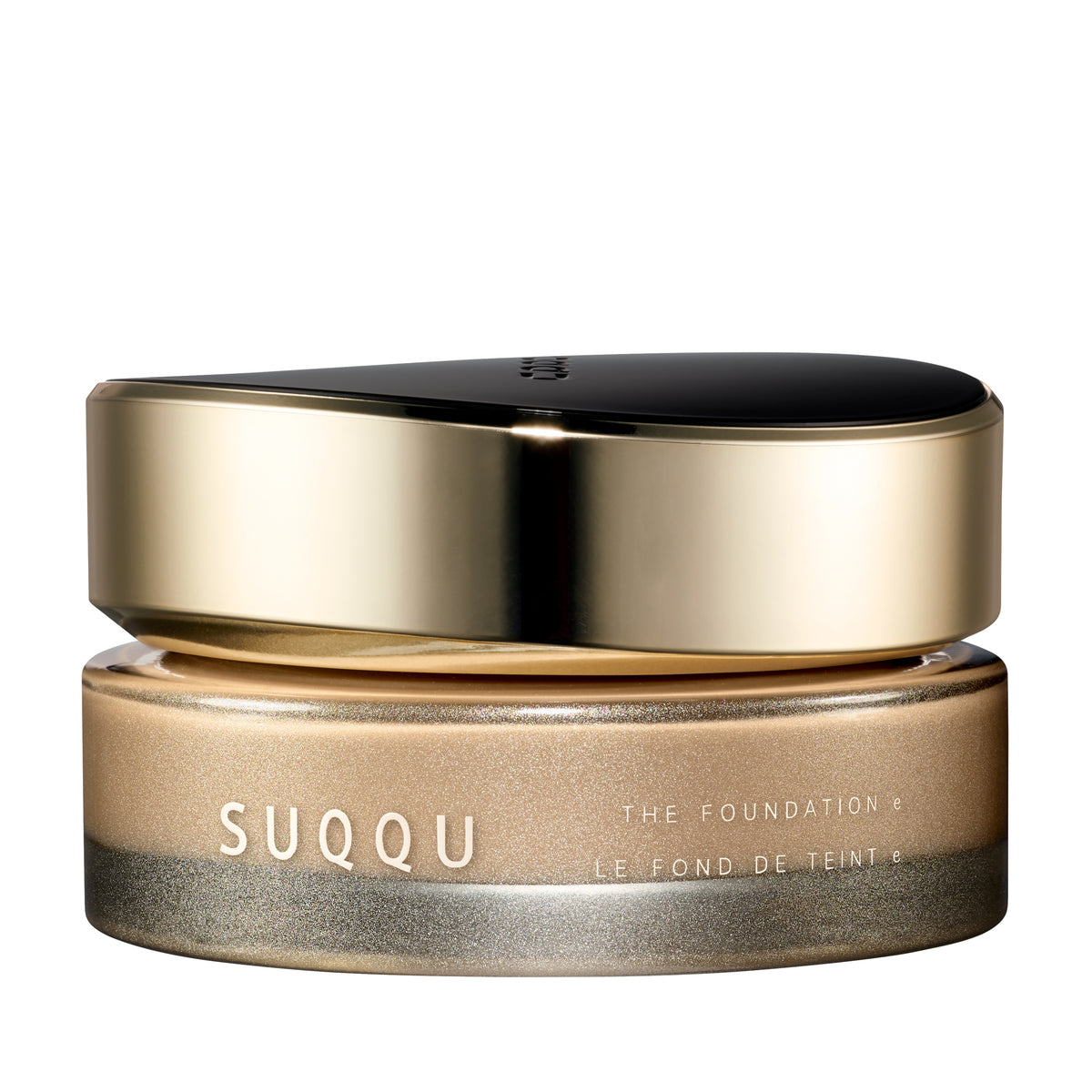 SUQQU The Foundation e 025 luxury cream base makeup jar on plain white background with gold and black lid and frosted glass base. Light to Medium beige cream foundation shade.