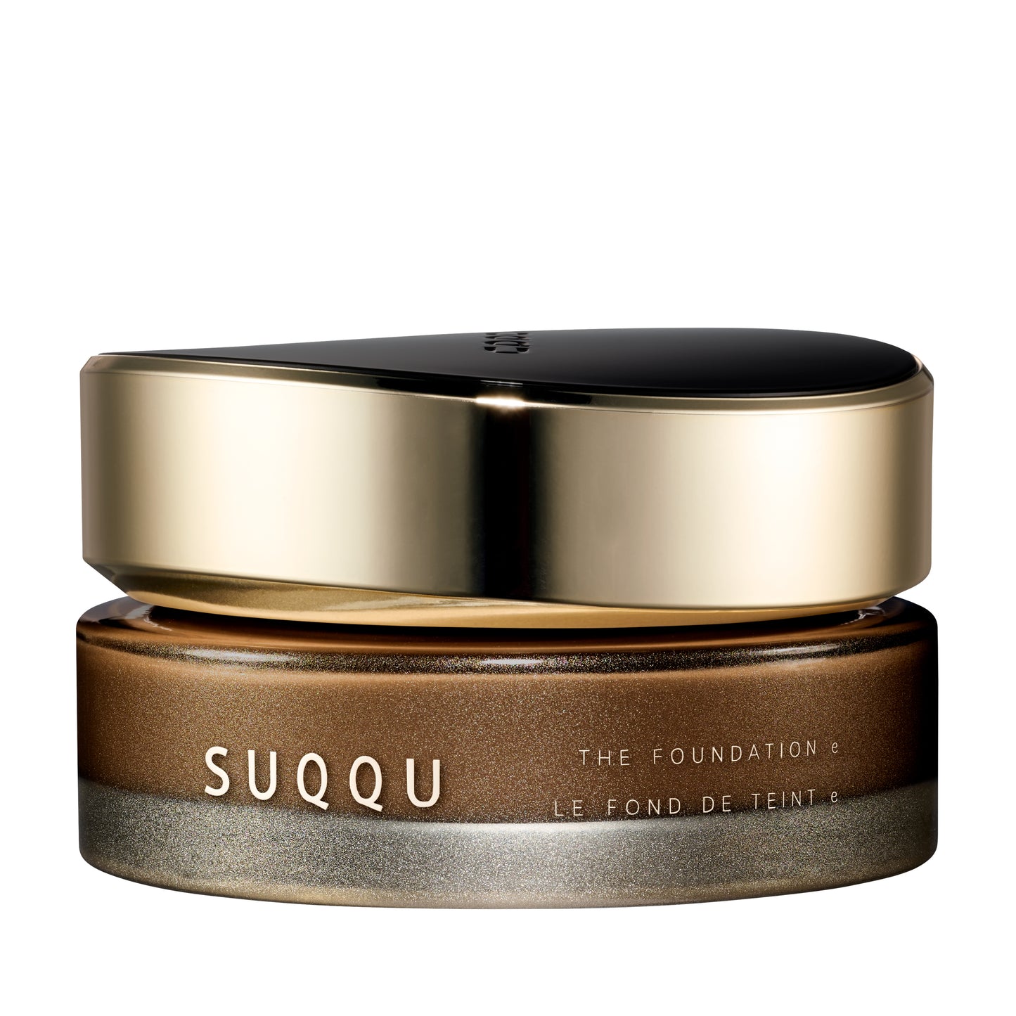 SUQQU The Foundation e 265 luxury cream base makeup jar on plain white background with gold and black lid and frosted glass base. Medium to deep brown cream foundation shade.