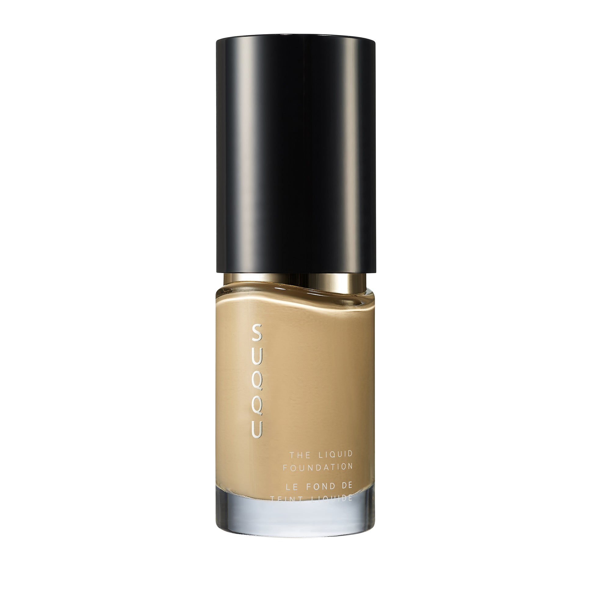 SUQQU The Liquid Foundation 025 luxury Japanese base make up bottle on plain background.