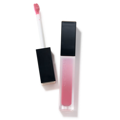 SUQQU Treatment Wrapping Lip 06 beautiful pink juicy lip gloss showing with wand open and package closed.