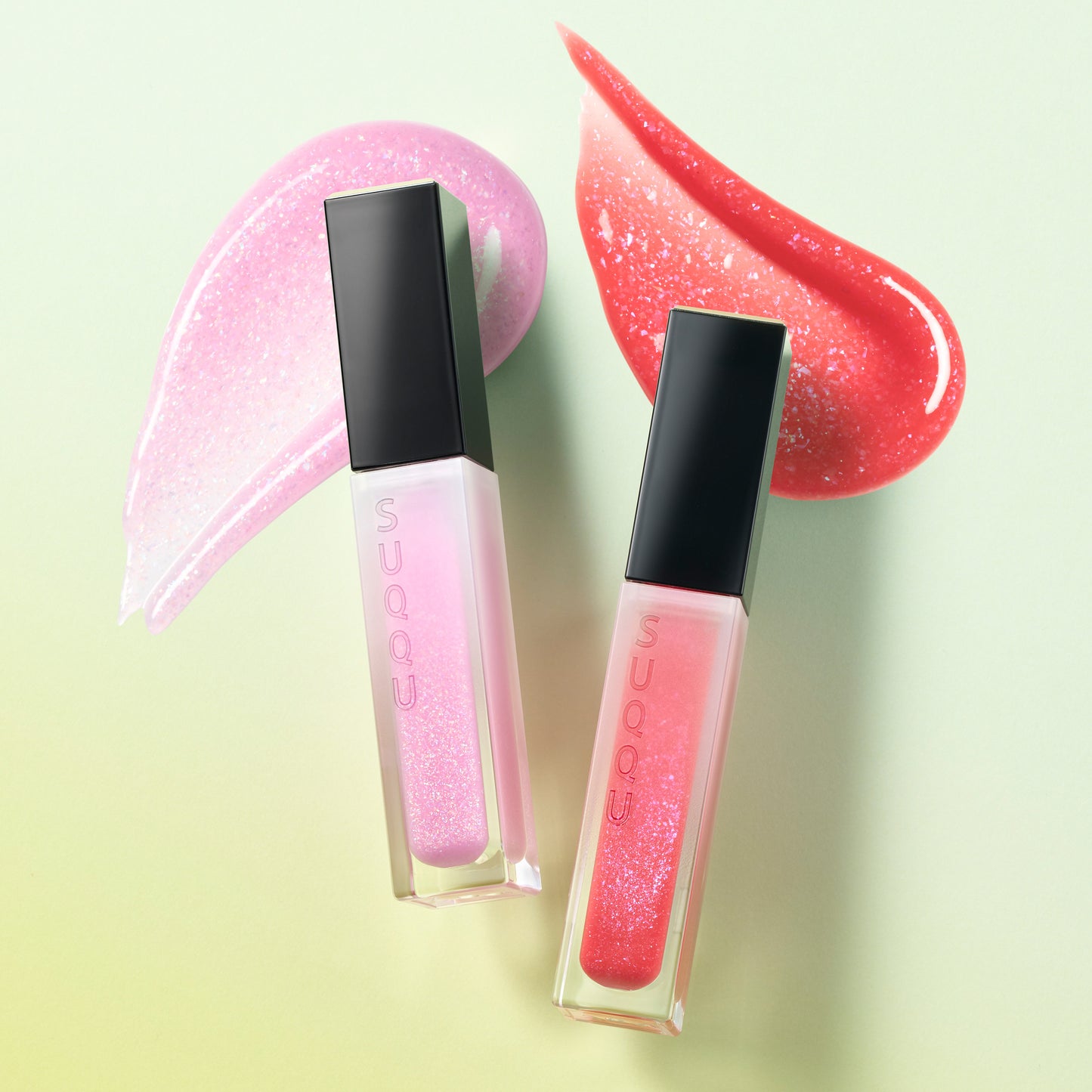 SUQQU 2026 Pre-Summer Collection two Treatment Wrapping Lip colour lip gloss lipsticks in sparkle clear shine pink tone 109 and sparkling red glitter tone 110, open with colourful glittery texture swatches.