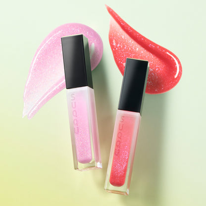 SUQQU 2026 Pre-Summer Collection two Treatment Wrapping Lip colour lip gloss lipsticks in sparkle clear shine pink tone 109 and sparkling red glitter tone 110, open with colourful glittery texture swatches.