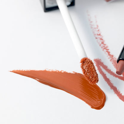 SUQQU Treatment Wrapping Lip colour product close up with wand and texture