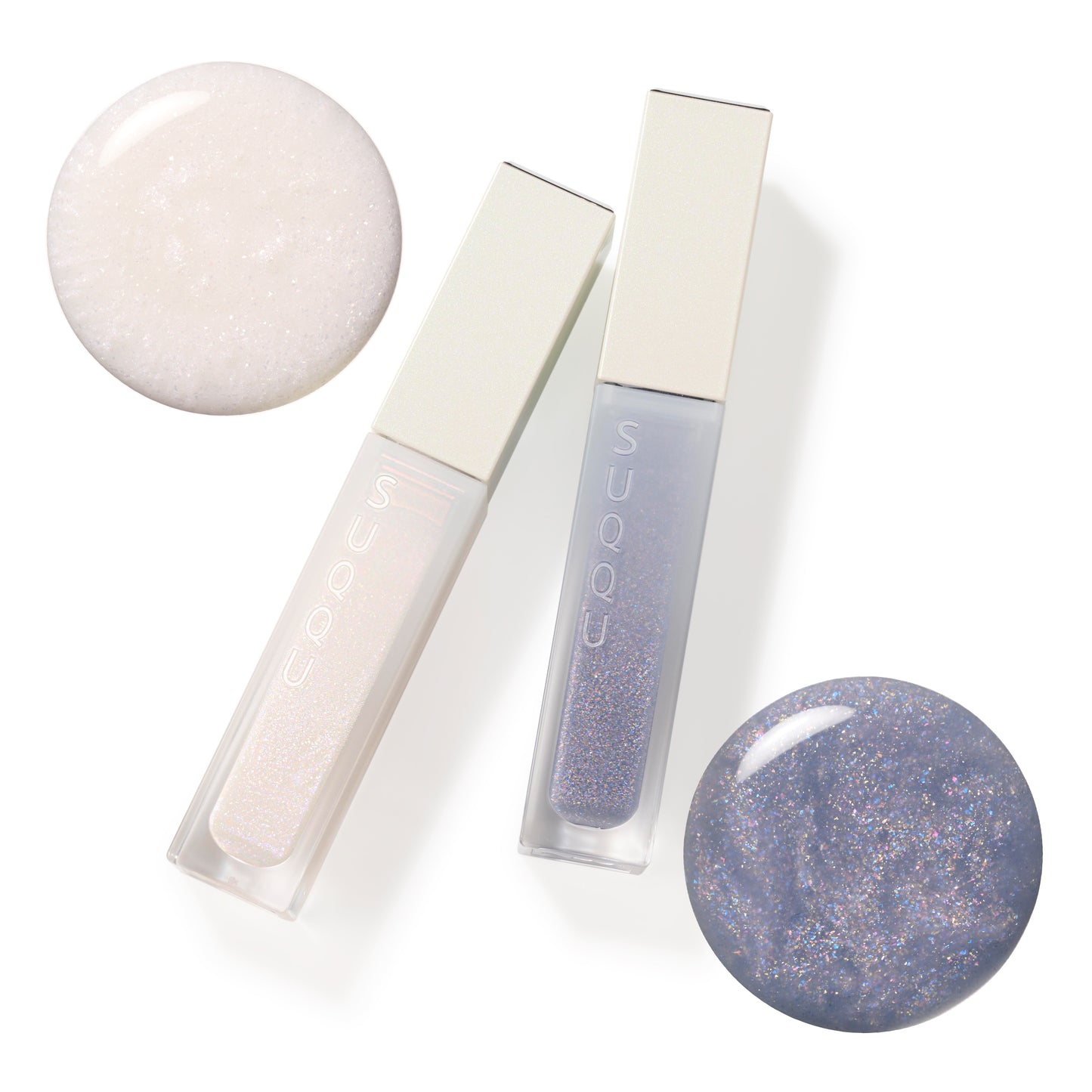 SUQQU Treatment Wrapping Lip 102 and 103 colour makeup products on plain background with liquid textures.