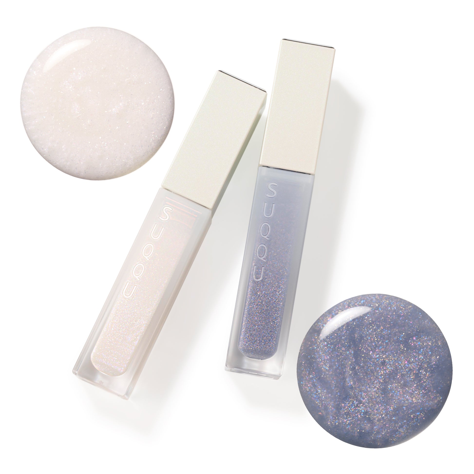 SUQQU Treatment Wrapping Lip 102 and 103 colour makeup products on plain background with liquid textures.