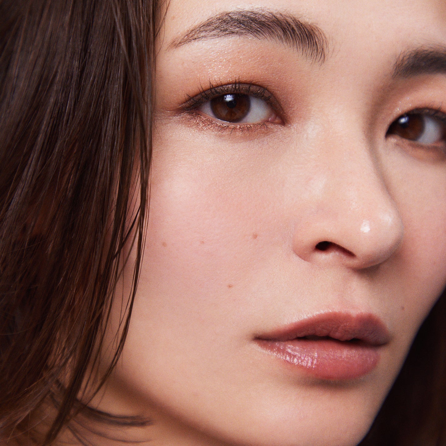 Rinnozoki Signature Color Eyes 15 eyeshadow palette worn by model in portrait.