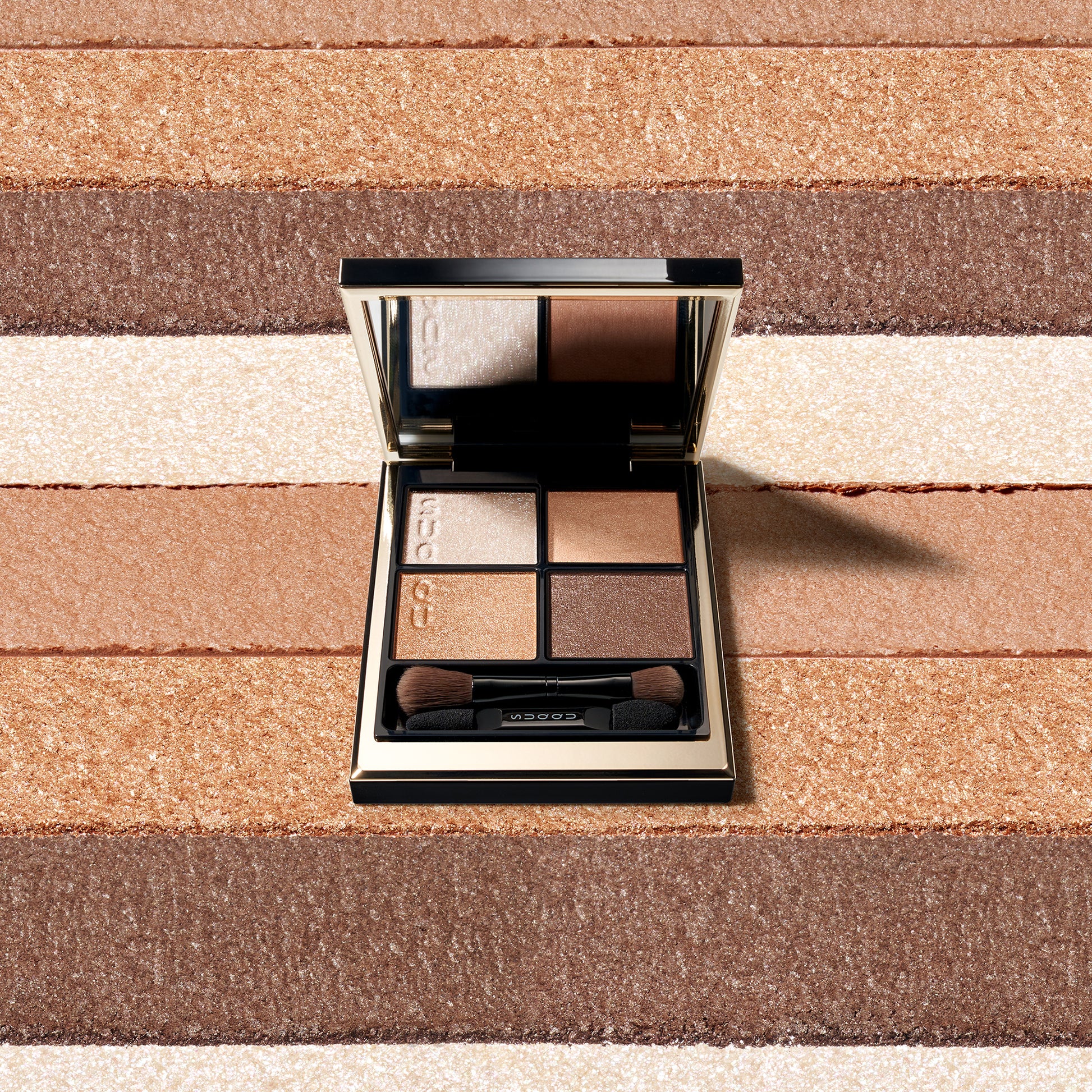 SUQQU Signature Color Eyes 15 palette with swatch colour texture background.