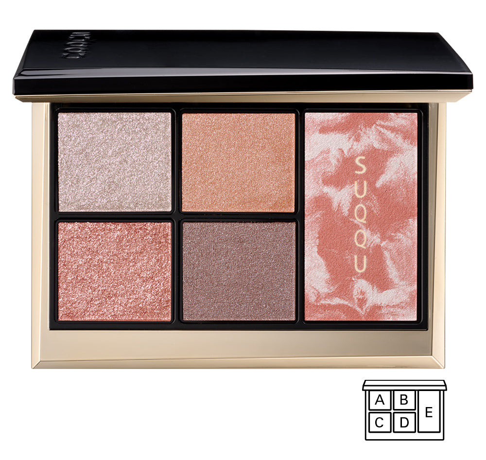 SUQQU Eye & Face Compact 104 four-pan eyeshadow and single pan blusher combination palette with a black lid and gold-toned case, featuring shimmering shades of silver, peach, rose gold, taupe, and a marbled pink shimmer pan with gold brand lettering. A small shade guide icon appears in the bottom right corner.