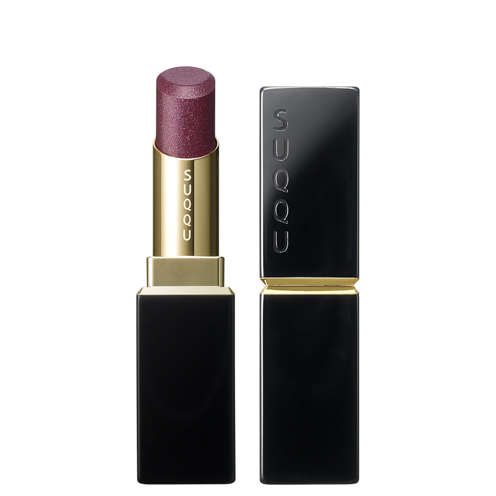 SUQQU Moisture Glaze Lipstick 116 purple berry shade with shimmering pearl glitter. Shown with case on white background.